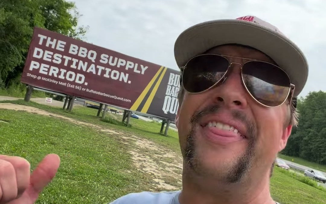 Pat in front of the first Buffalo Barbecue Quest billboard on the I-90. The BBQ supply destination. Period.